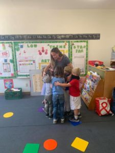 Molly says goodbye to the preschoolers she taught in California.